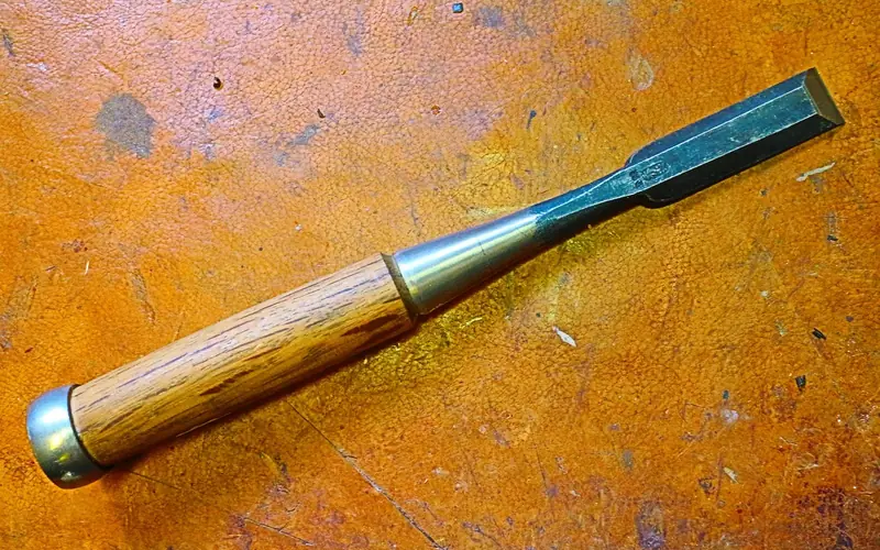 Wood chisel with oak handle used to pare hinge fingers clean Wood chisel with oak handle used to pare hinge fingers clean