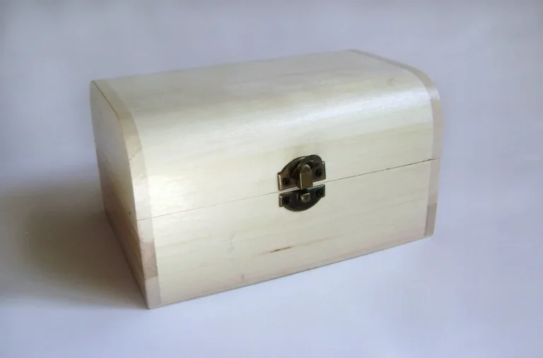 Plain unfinished wooden box with a brass latch, the kind of project a wood pyramid box replaces