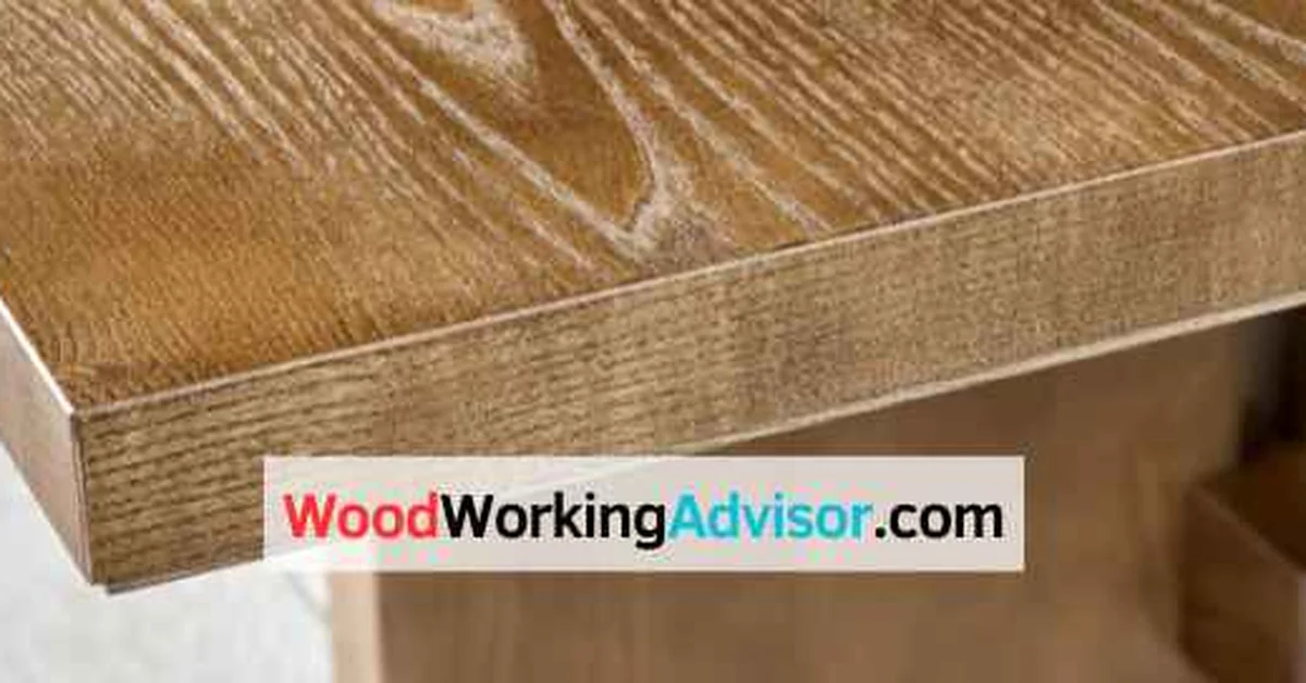 Close-up of solid ash hardwood tabletop showing natural grain pattern