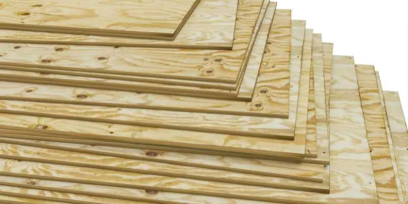 Stacked plywood sheets showing cross-grain veneer layers