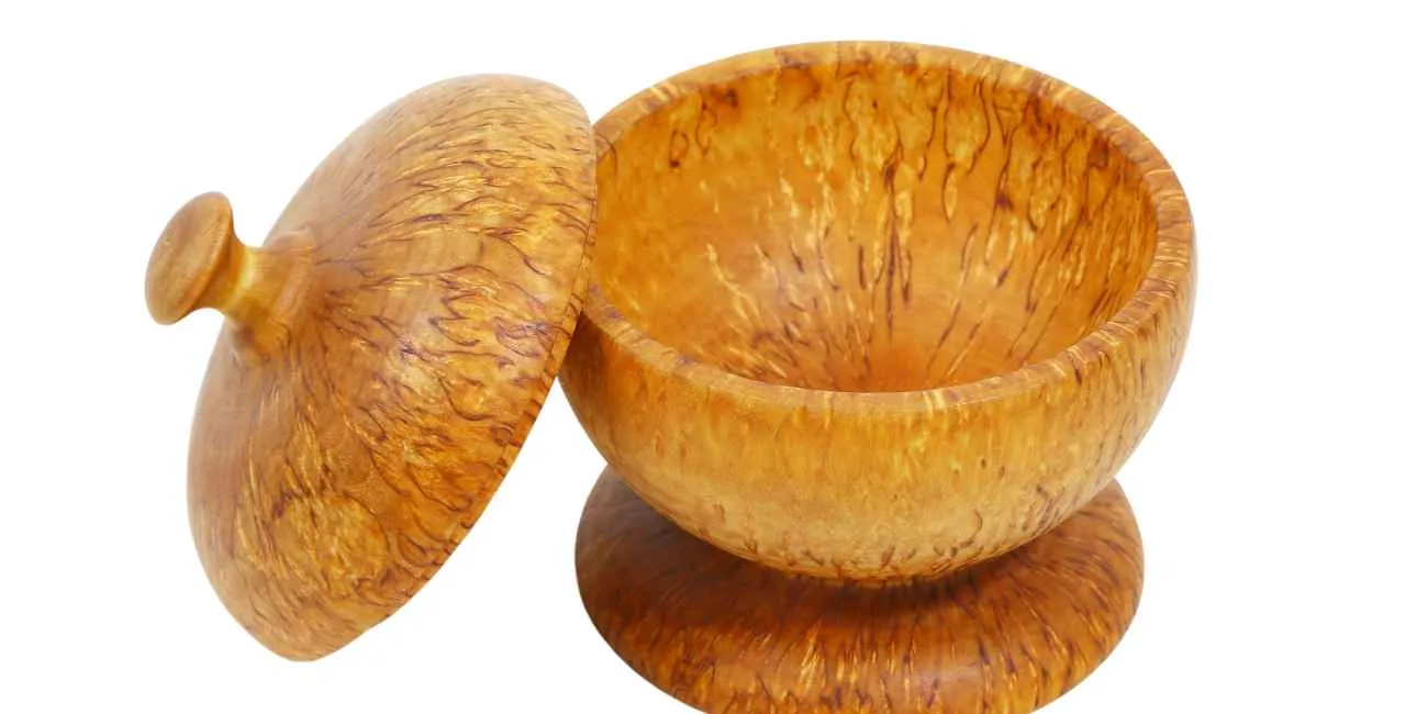 Hand-turned wooden bowl with matching lid, a handmade wood gift finished on a lathe