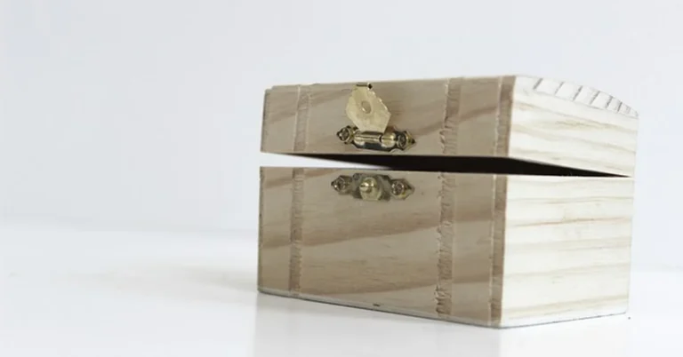 Wooden box with brass hasp lock latch and key installed