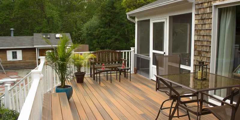 Composite deck with bench and planters