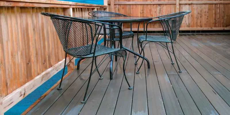 Composite deck boards with outdoor furniture
