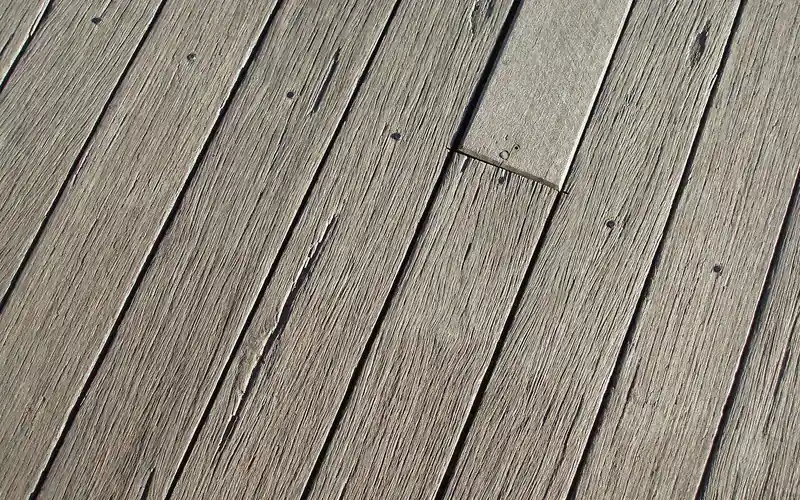 Close-up of decking boards showing capped surface grain texture Close-up of decking boards showing capped surface grain texture