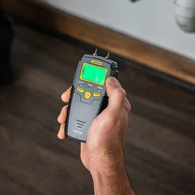 General Tools MMD4E digital pin-type moisture meter for checking subfloor moisture before hardwood installation