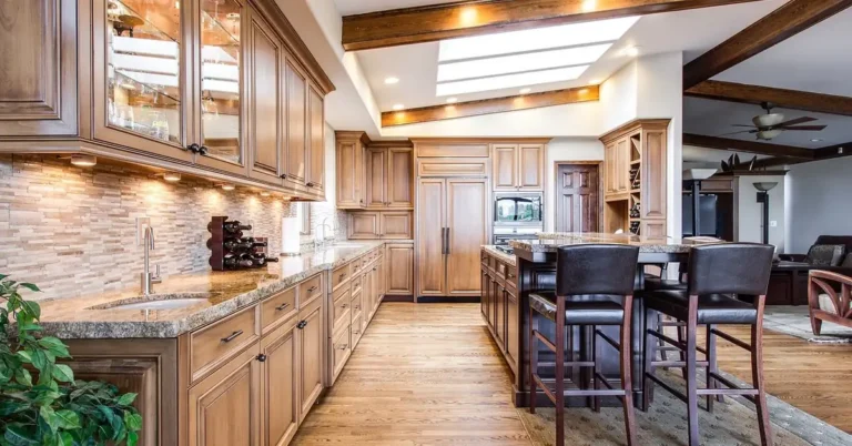 Bright kitchen with hardwood floor and wood cabinetry
