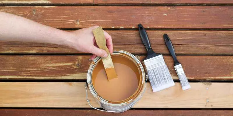 Pressure-treated wood finished with a cedar-tone semi-transparent stain