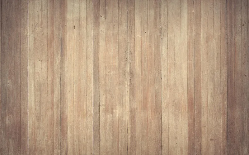 Weathered natural wood deck boards before cleaning and staining