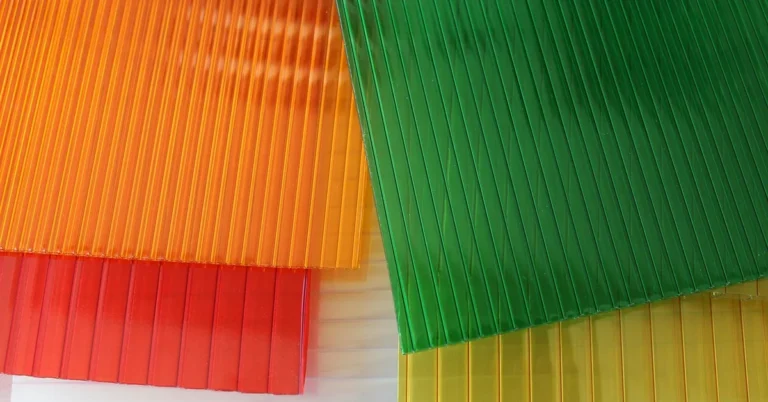 Transparent plastic sheet material layers