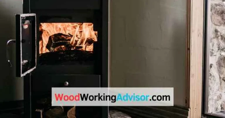Wood-fired firebox burning logs for a DIY wood burning pool heater