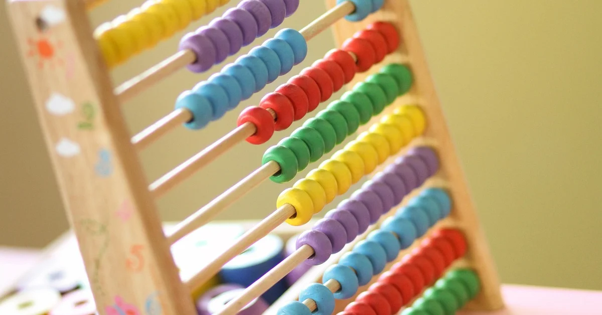 Wooden calculator kit abacus with colorful bead counting rows for STEM learning