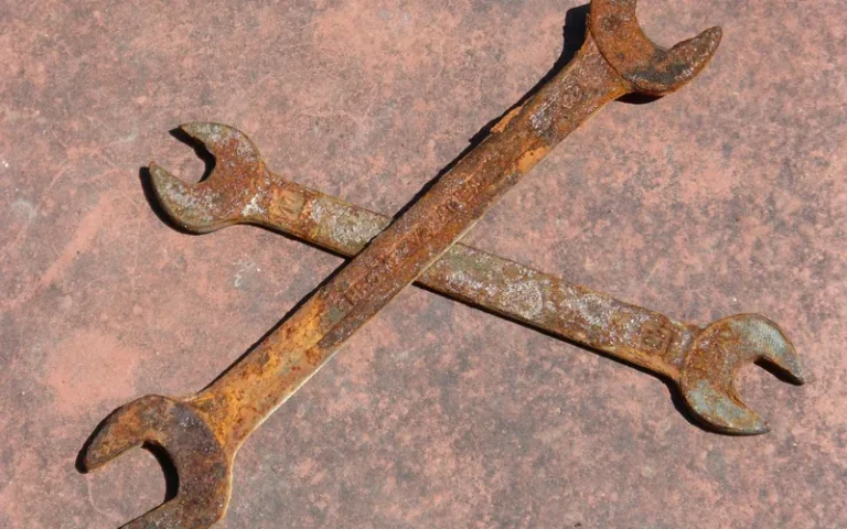 close-up of a rusty fixed wrench showing surface oxide corrosion