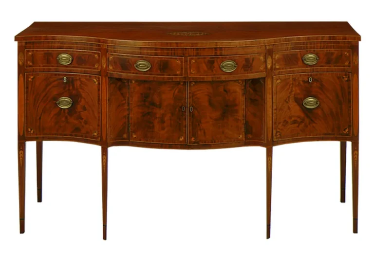 Antique mahogany sideboard showing the wood's reddish-brown color and flame grain figuring