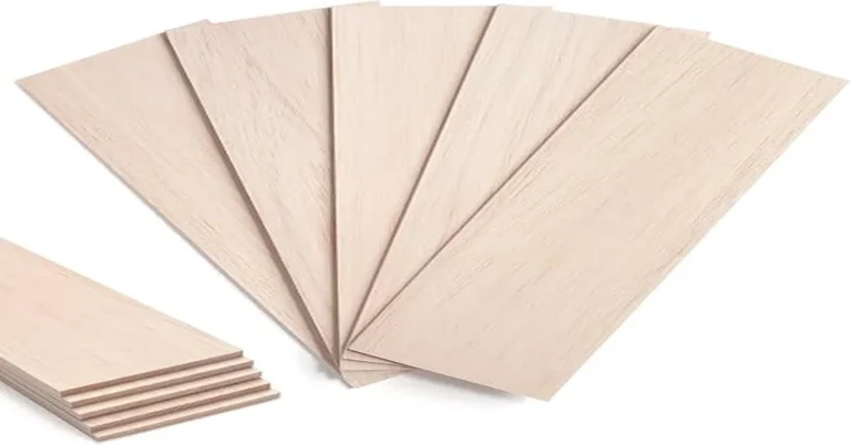 Stack of thin balsa wood sheets and planks used for model making