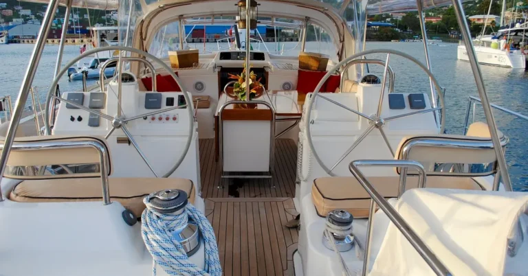 teak cockpit sole and steering wheels on a sailing yacht deck