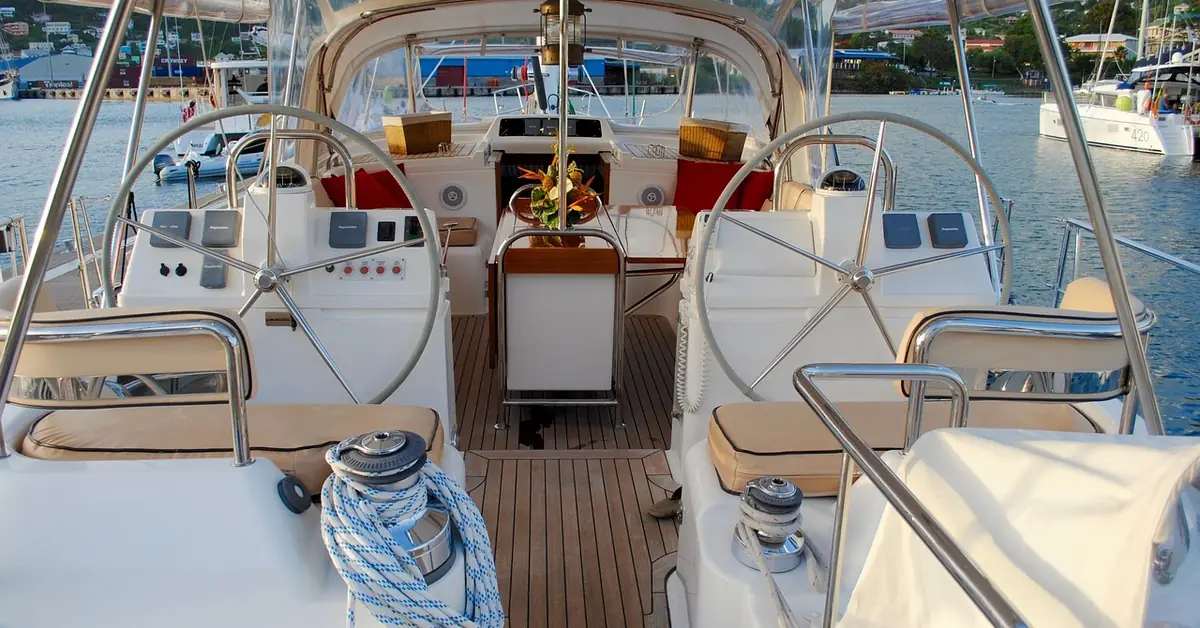 teak cockpit sole and steering wheels on a sailing yacht deck
