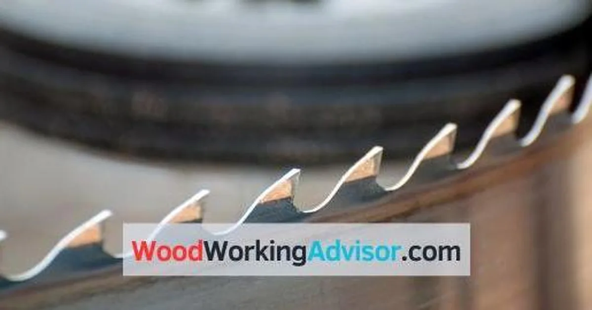 Close-up of a vintage Boice-Crane band saw blade and wheel