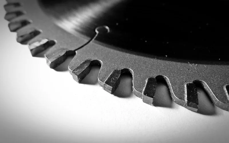 carbide-tipped saw blade teeth shown in close-up detail carbide-tipped saw blade teeth shown in close-up detail