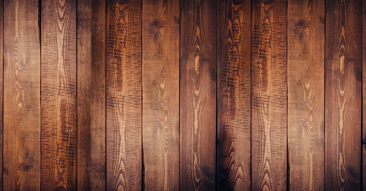 Engineered wood flooring planks showing wear layer construction