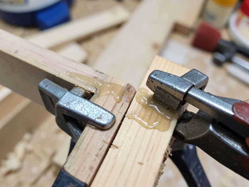 Clamping a glued wood joint on bare wood, to be stained after the glue cures
