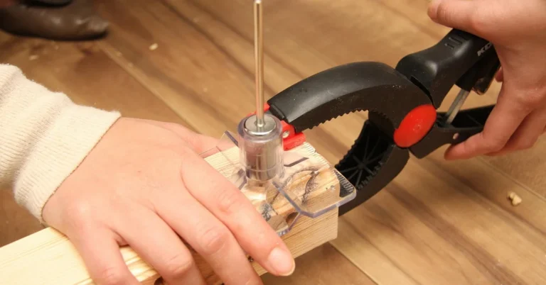 Hand clamping a wood joint with a trigger clamp during a glue-up
