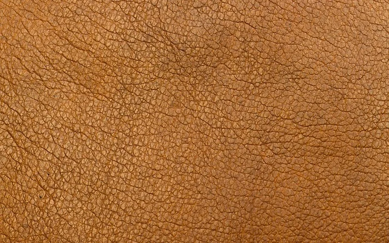Close-up of full-grain leather texture and grain pattern Close-up of full-grain leather texture and grain pattern
