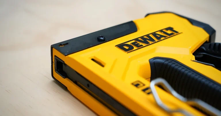 Pneumatic brad nailer used to attach crown molding trim to cabinets