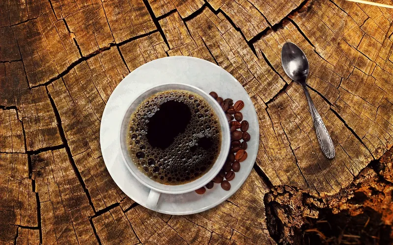 Cup and saucer on a wood surface where rings can form Cup and saucer on a wood surface where rings can form