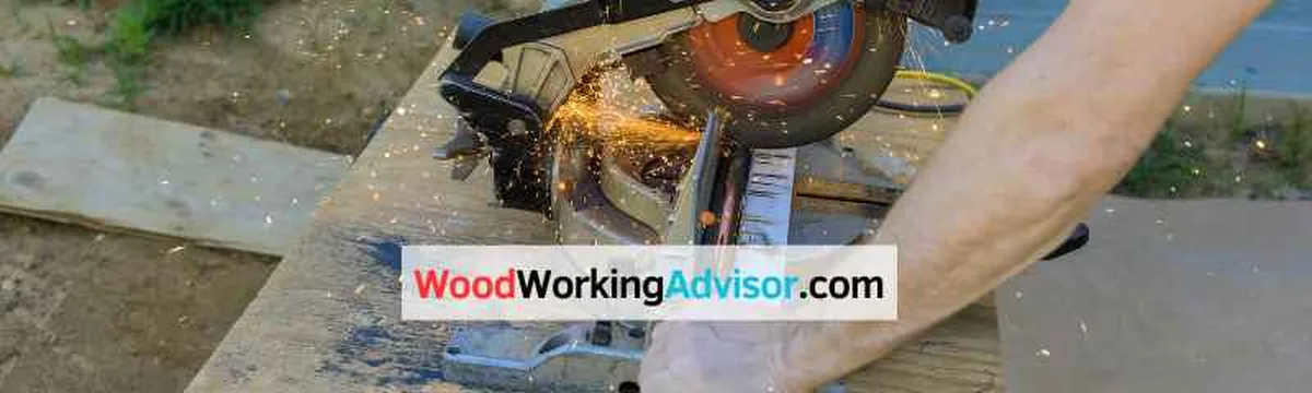 DeWalt DW703 10-inch compound miter saw cutting lumber with sparks flying