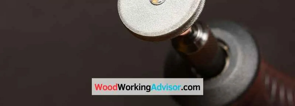 Dremel rotary tool fitted with a metal cutting wheel for cutting steel