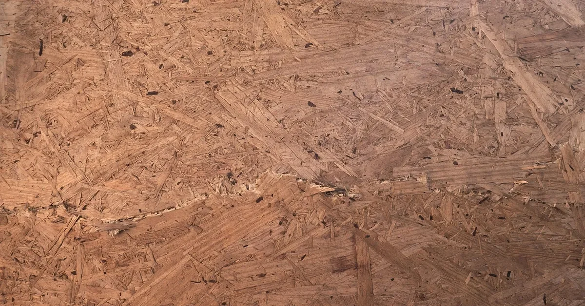 Close-up of an OSB panel showing compressed oriented wood strands