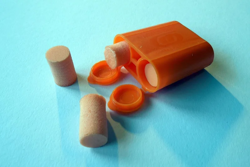 Foam earplugs and a case, standard hearing protection for noisy saw work Foam earplugs and a case, standard hearing protection for noisy saw work