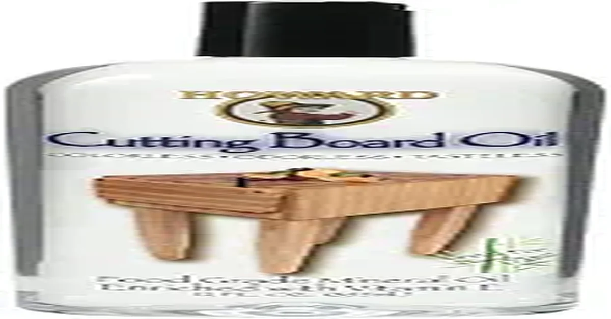Bottle of food grade mineral oil next to a wood cutting board