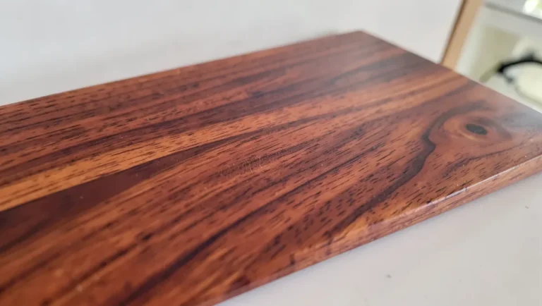Genuine mahogany wood board with reddish-brown grain