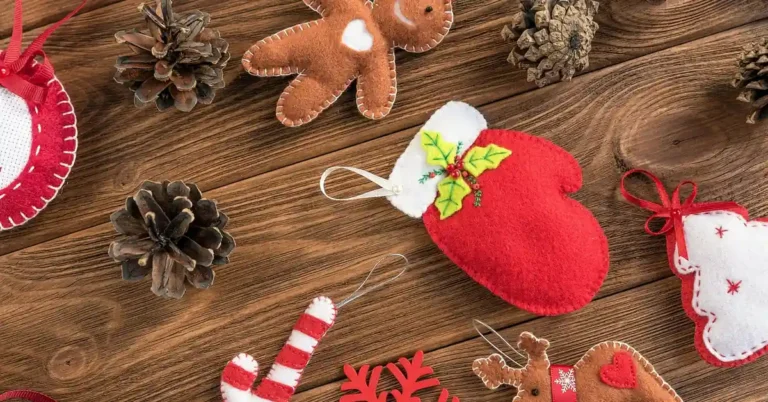 Felt craft pieces resting on a natural wood plank surface