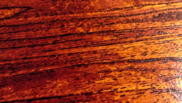 Rich reddish-brown mahogany wood grain