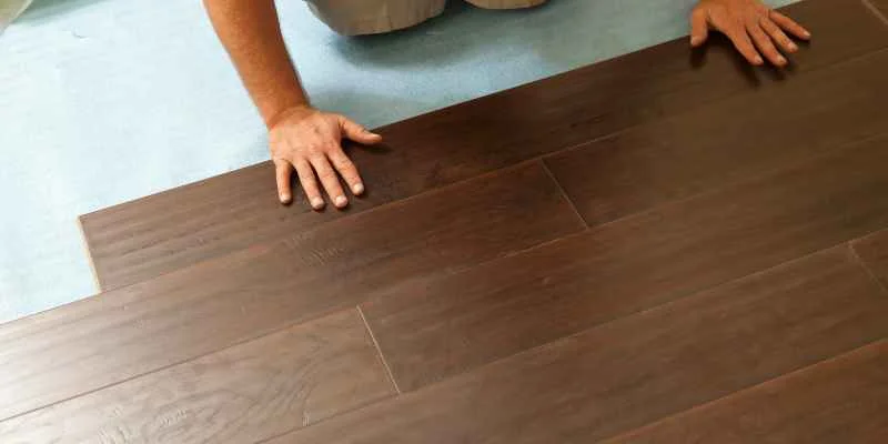 Tongue and groove hardwood flooring planks milled from raw lumber
