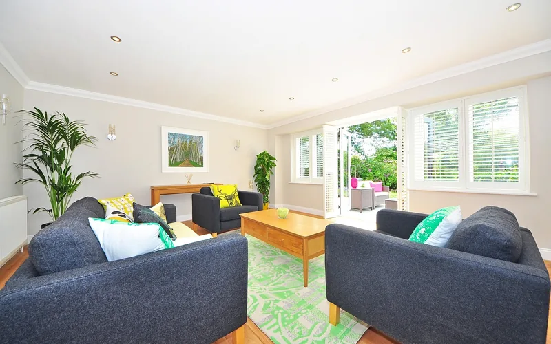 modern living room with light oak hardwood flooring and large windows modern living room with light oak hardwood flooring and large windows
