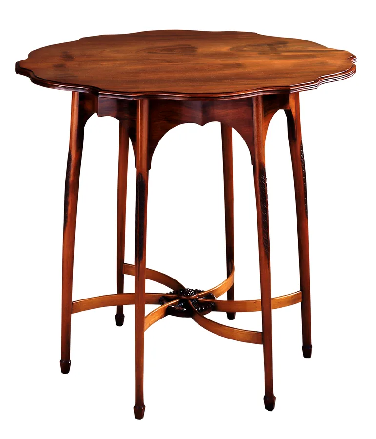 Antique mahogany side table showing the deep reddish-brown color and grain a traditional oil finish brings out Antique mahogany side table showing the deep reddish-brown color and grain a traditional oil finish brings out