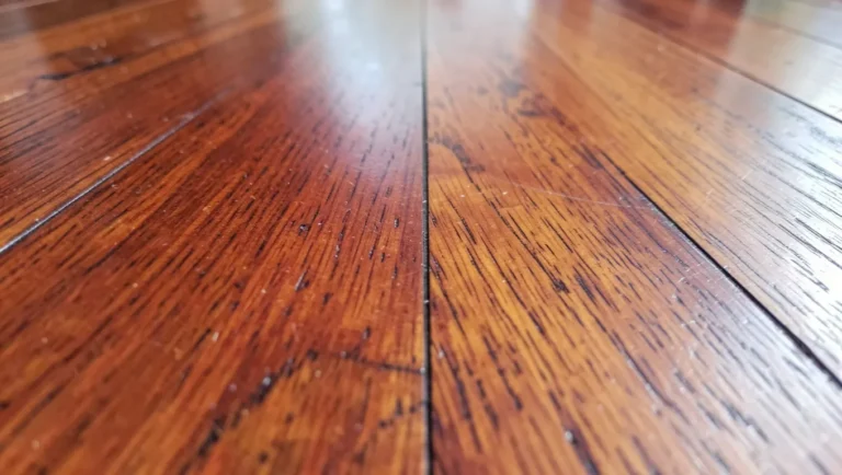 Close-up of reddish-brown mahogany hardwood floor boards
