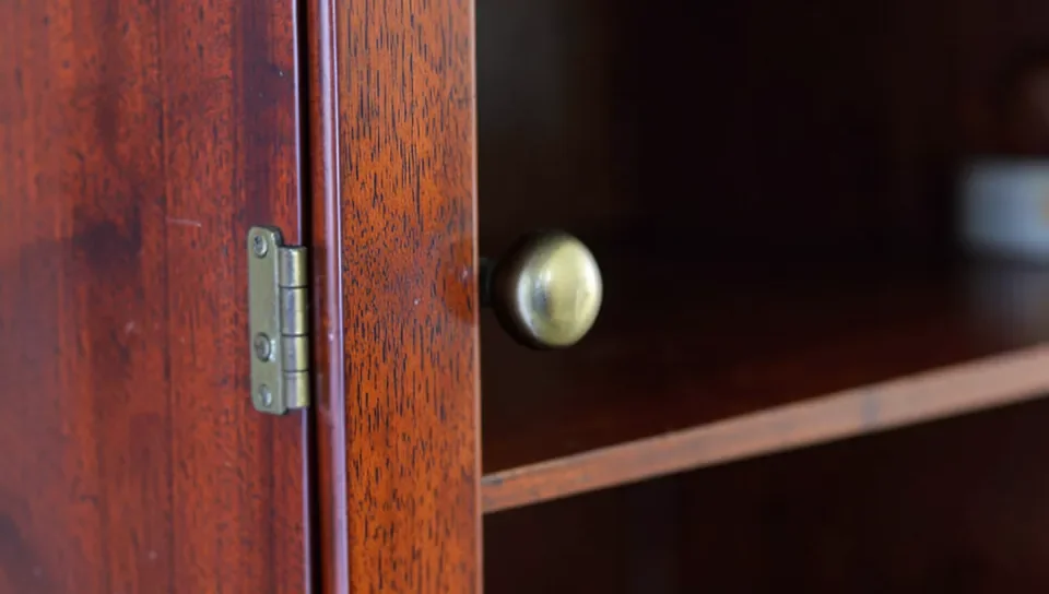 Close-up of a mahogany hutch cabinet door