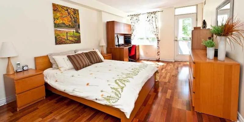 Mahogany wood bed in a bedroom setting