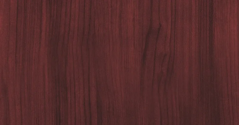 Reddish-brown mahogany wood grain close-up