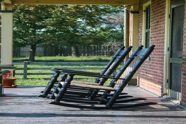 Handcrafted walnut low-back wooden chair in the Maloof style