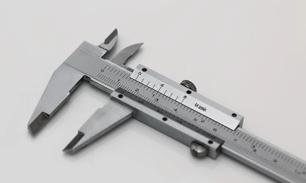 Caliper used to check bandsaw blade gauge and width before resawing