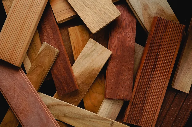Wood flooring planks showing natural color variation between boards
