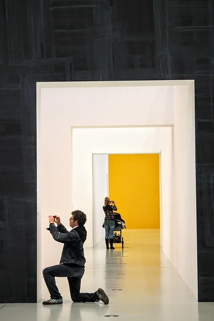 Museum gallery visitors, representing the museum collections that hold Maloof furniture