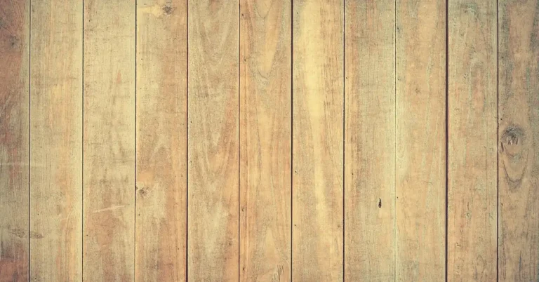 Light hardwood floor planks refinished with a screen-and-recoat, no-sand method