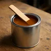 Oil-based pre-stain wood conditioner in a metal can